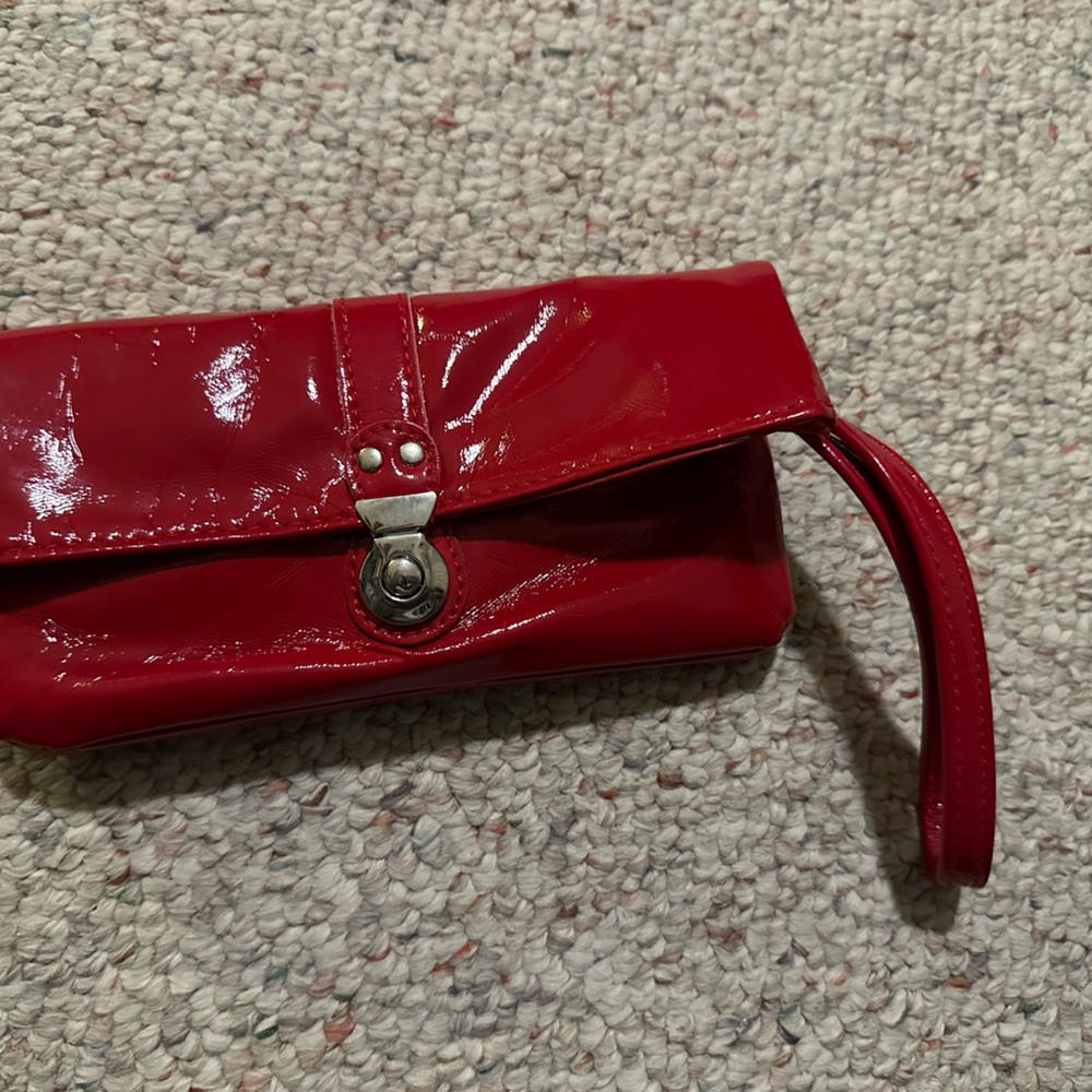 Red purse with wrist strap no brand